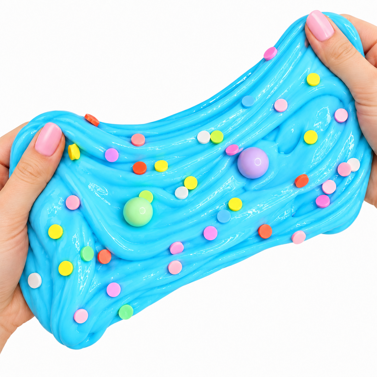 Two hands stretching blue bubblegum scented thick and glossy slime