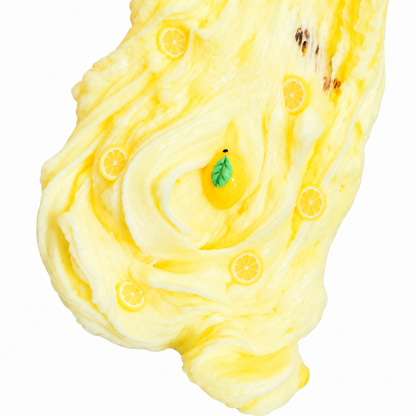 Frozen Lemonade hybrid slime stretched to show its creamy texture with lemon fimos
