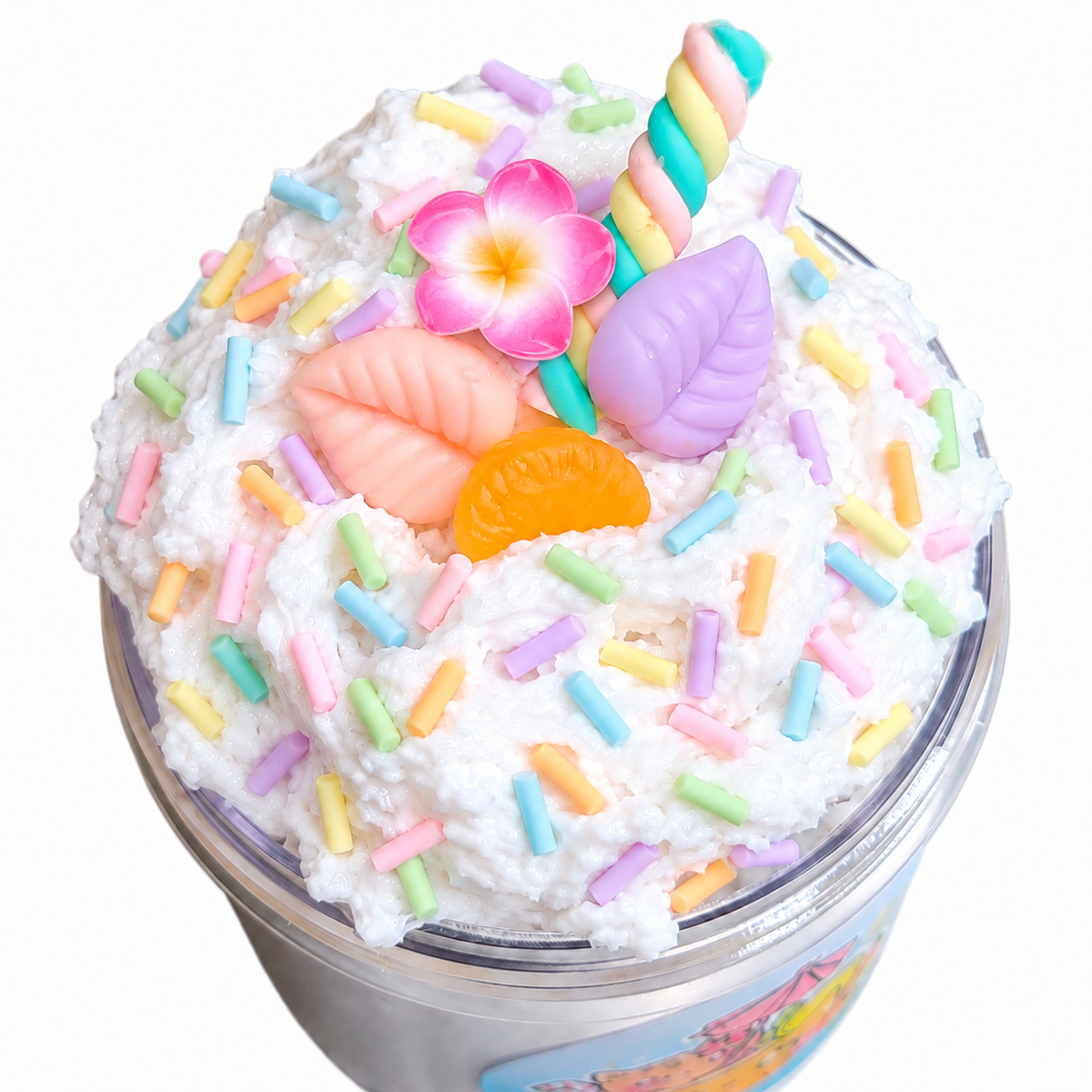 Open Piña Colada snow fizz slime jar topped with five charms and pastel sprinkles