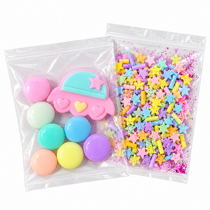 Pastel candy pieces, kawaii UFO charm, and sprinkle pack included with UFO Candy Crunch